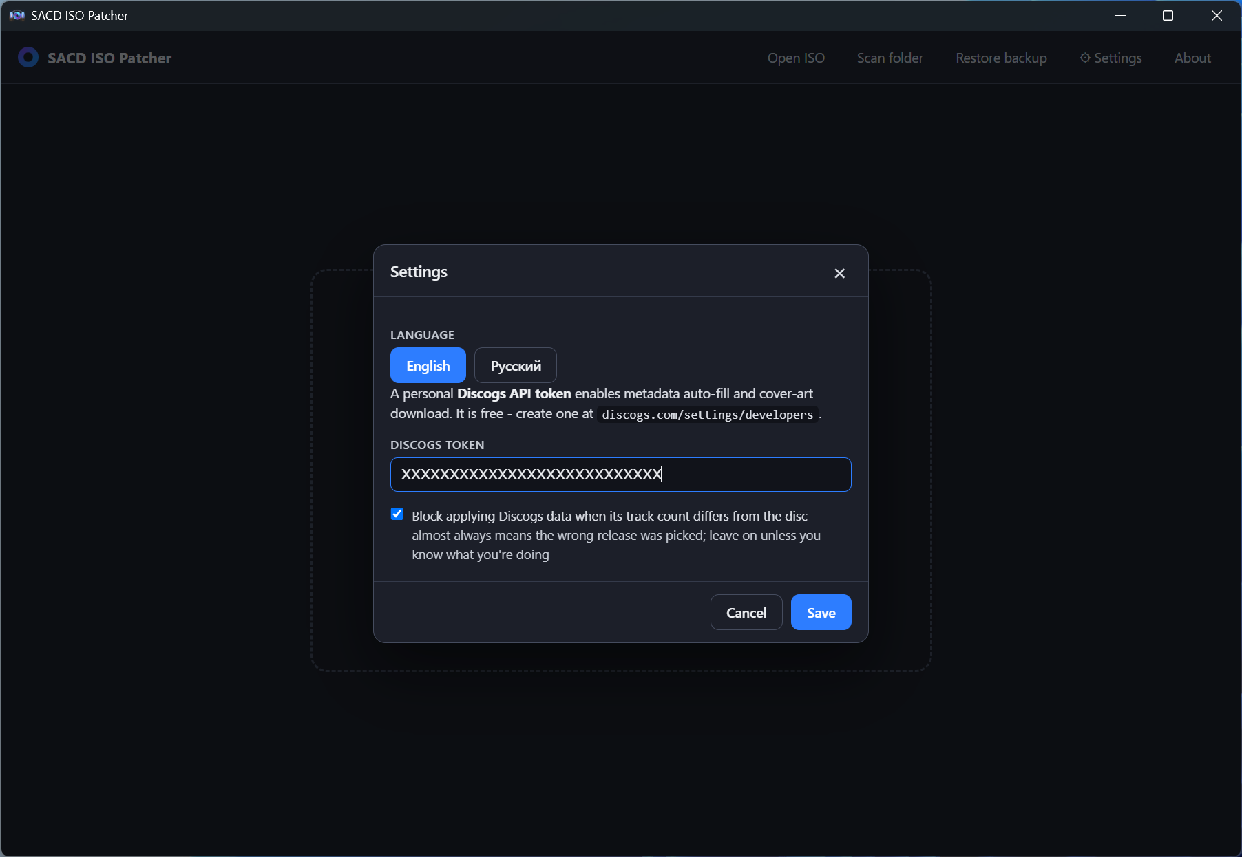 Settings dialog with language and Discogs token